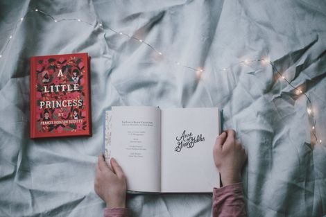 Reading on bed sheet